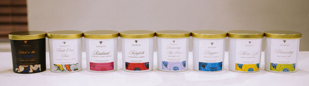 display of several boldly designed soy wax candles