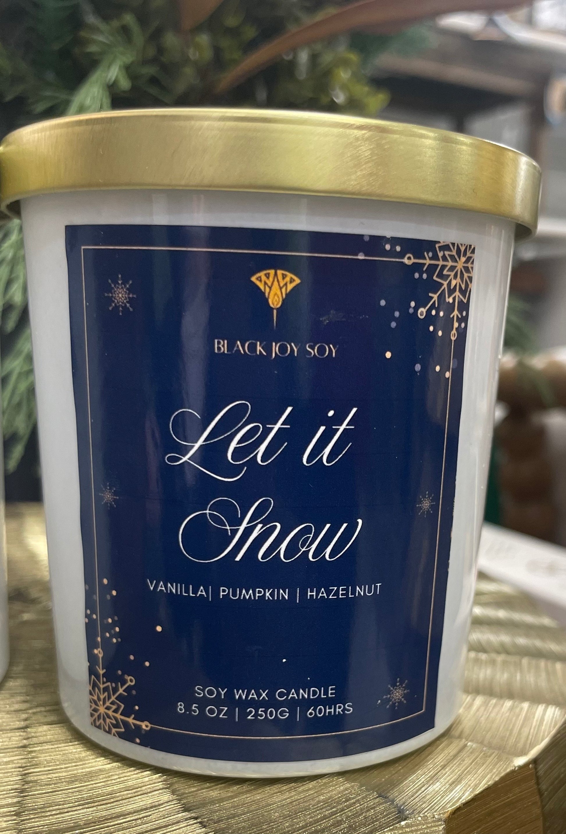 Soy Candle with 'Let it Snow' label, vanilla, pumpkin and hazelnut scented soy candle