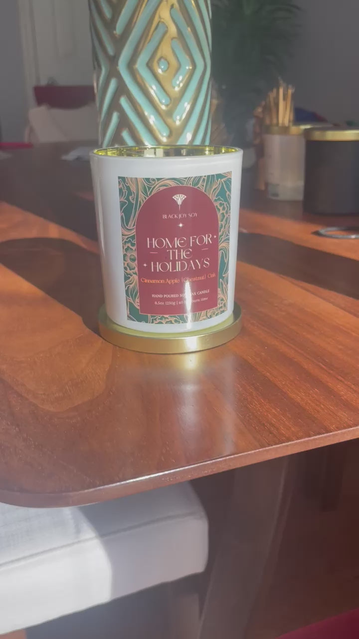 video of decorative holiday candle. Apple chestnut, oak and praline scented candle.